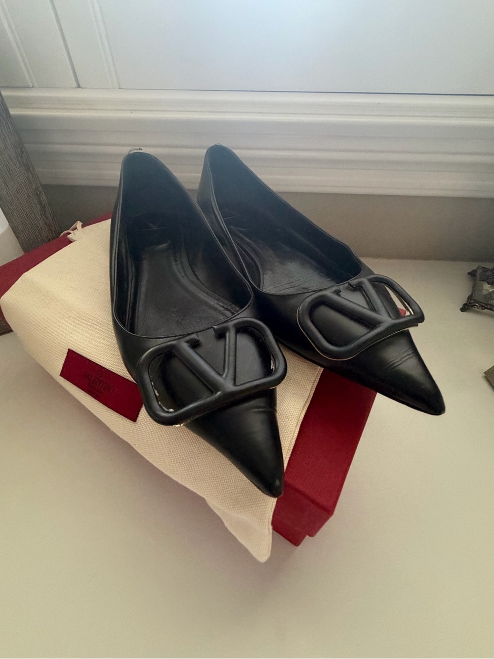 Valentino Garavani Black Pointed Leather Flats with V Buckle Accent